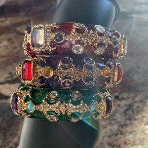 Roberto Cavalli crystal statement bracelets.